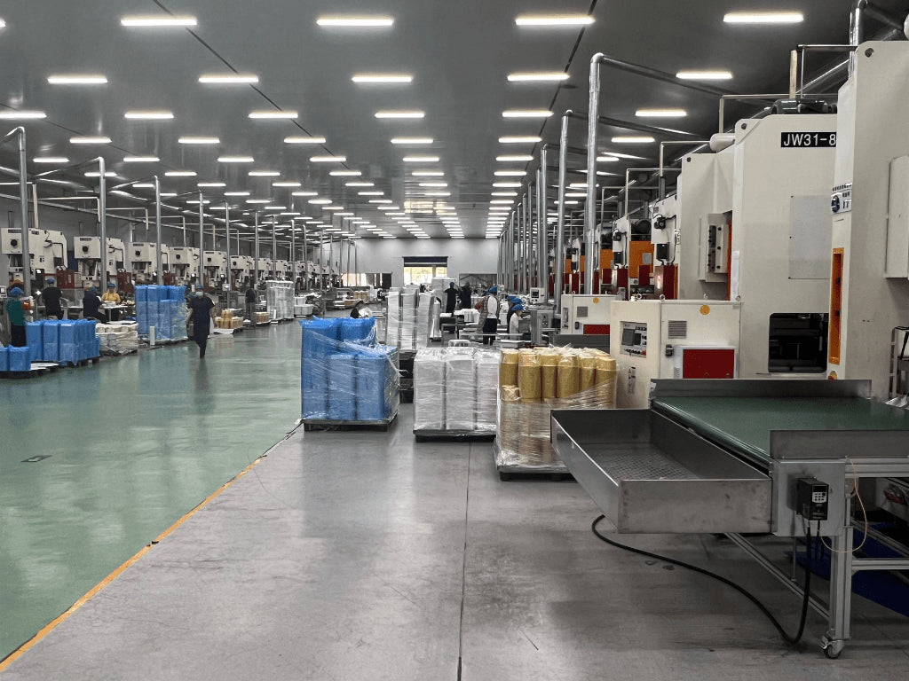Automated aluminum container production line at Foiltrust manufacturing plant
